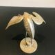 Couple of brass birds