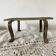 Low stool with wooden and metal slats