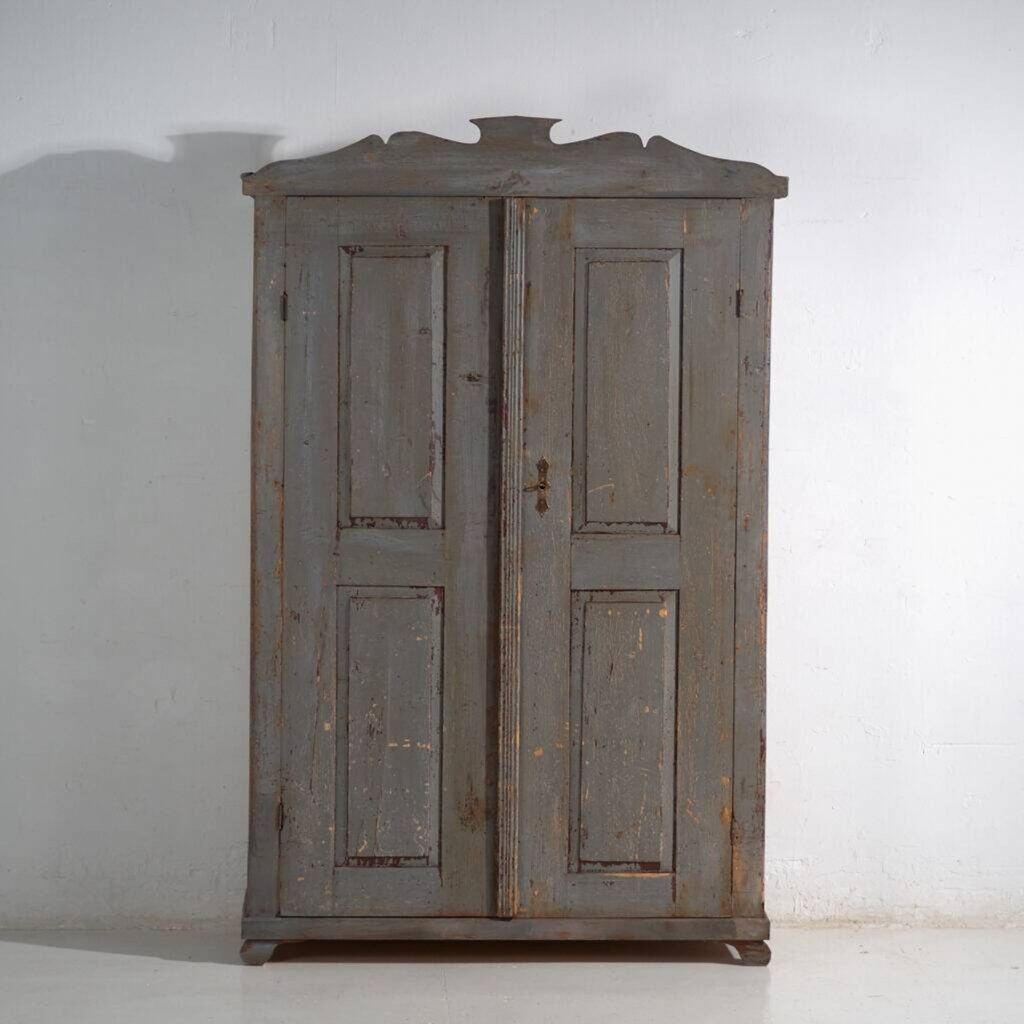 Rustic painted wardrobe in wood, Central Europe, circa 1900–1920