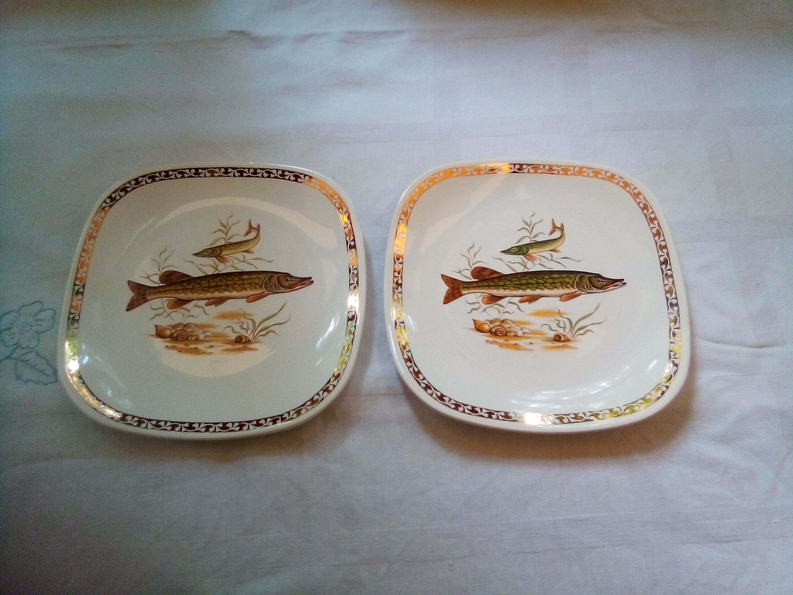 Set of 12 Longchamp plates and fish dish