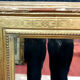 Miroir époque empire en bois doré 71x90cm