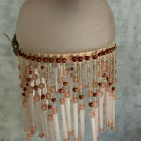 Pair of wall sconces in pink glass and pendants.