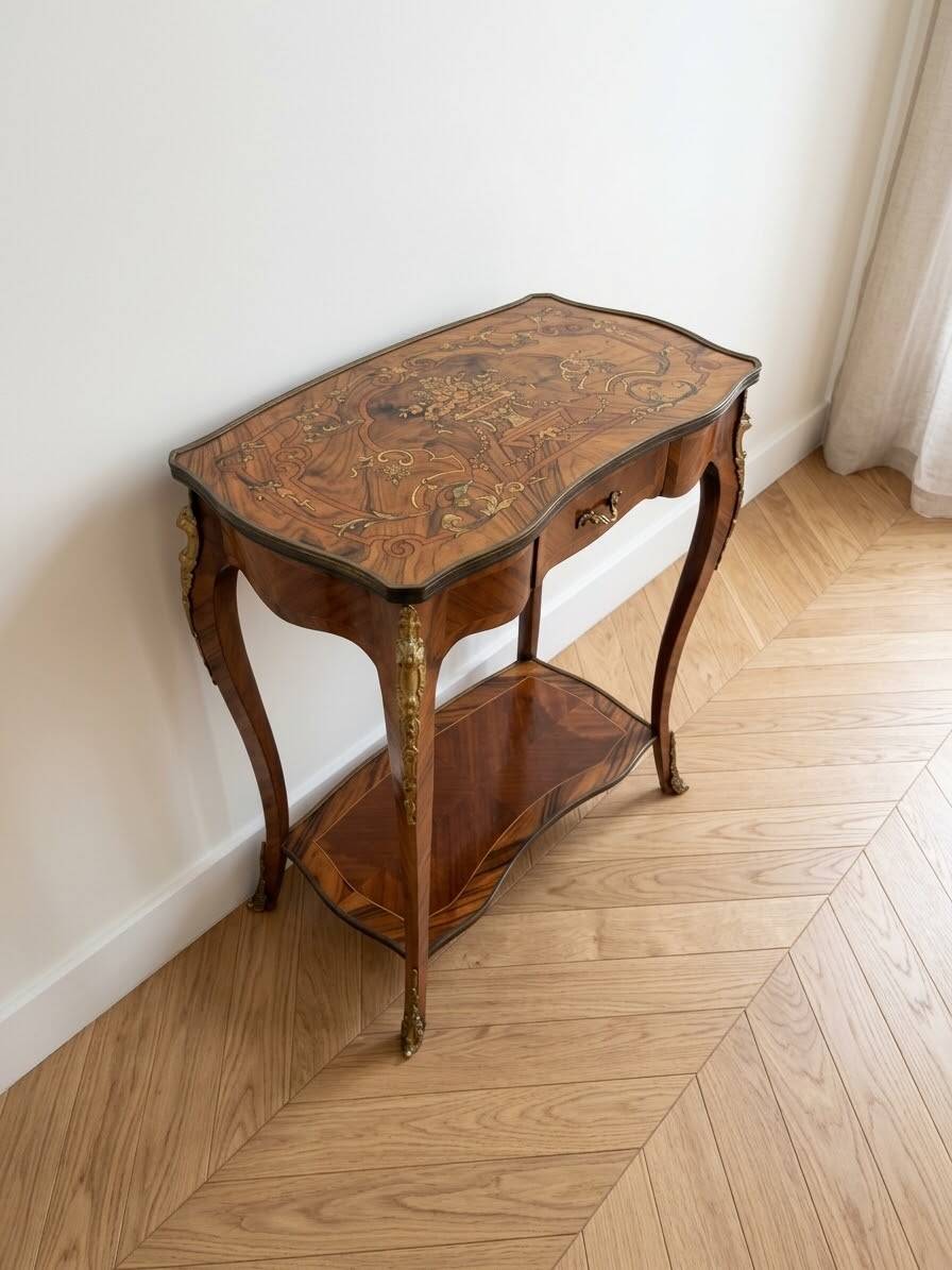 Louis XV console table with marquetry and bronze fittings.