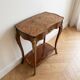 Louis XV console table with marquetry and bronze fittings.