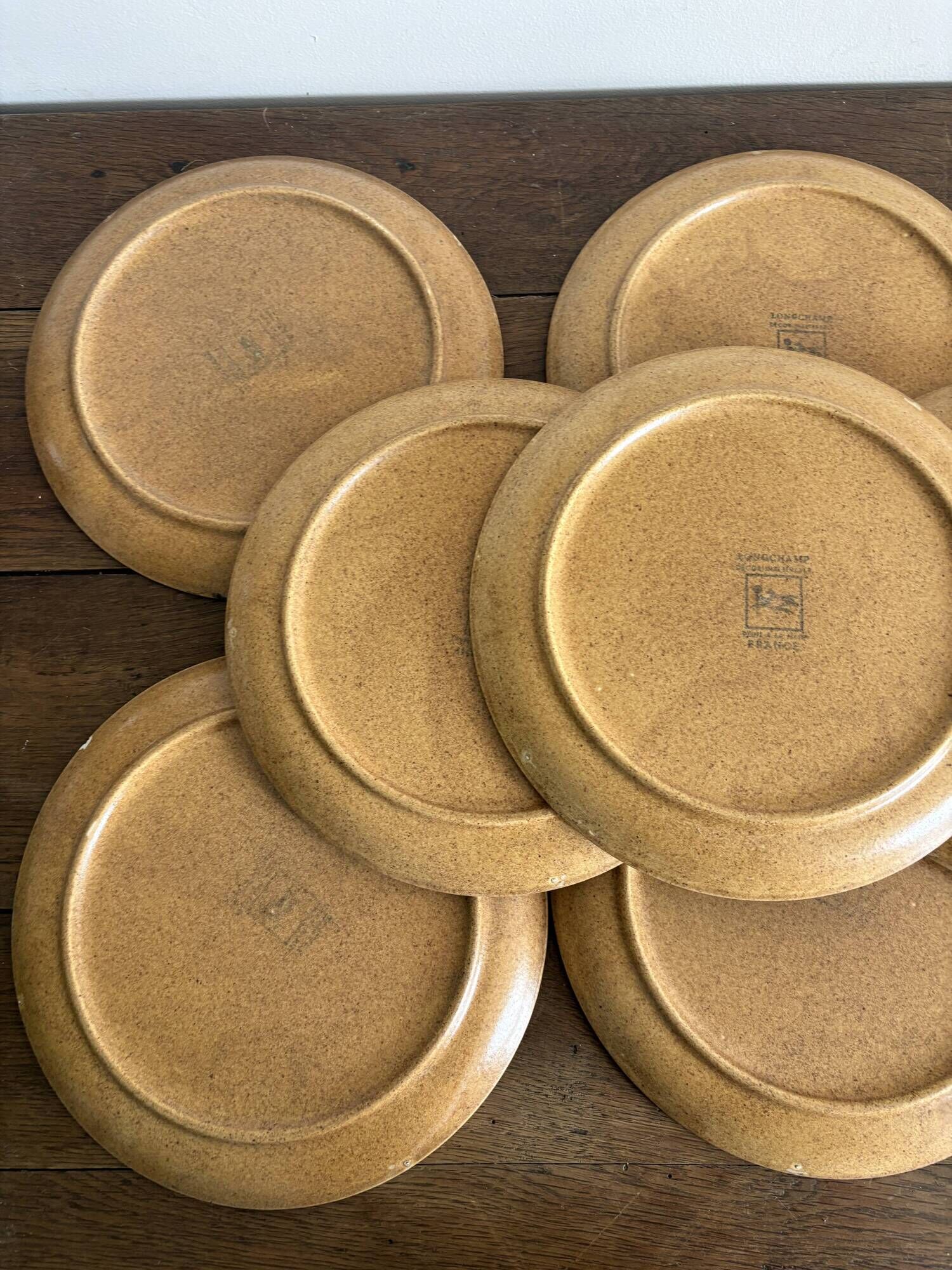 Service of 15 vintage Longchamp plates in stoneware.