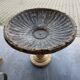 Vintage casted stone garden bowl on pedestal