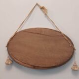 Oval mirror in wood and gilded plaster with pompom decoration