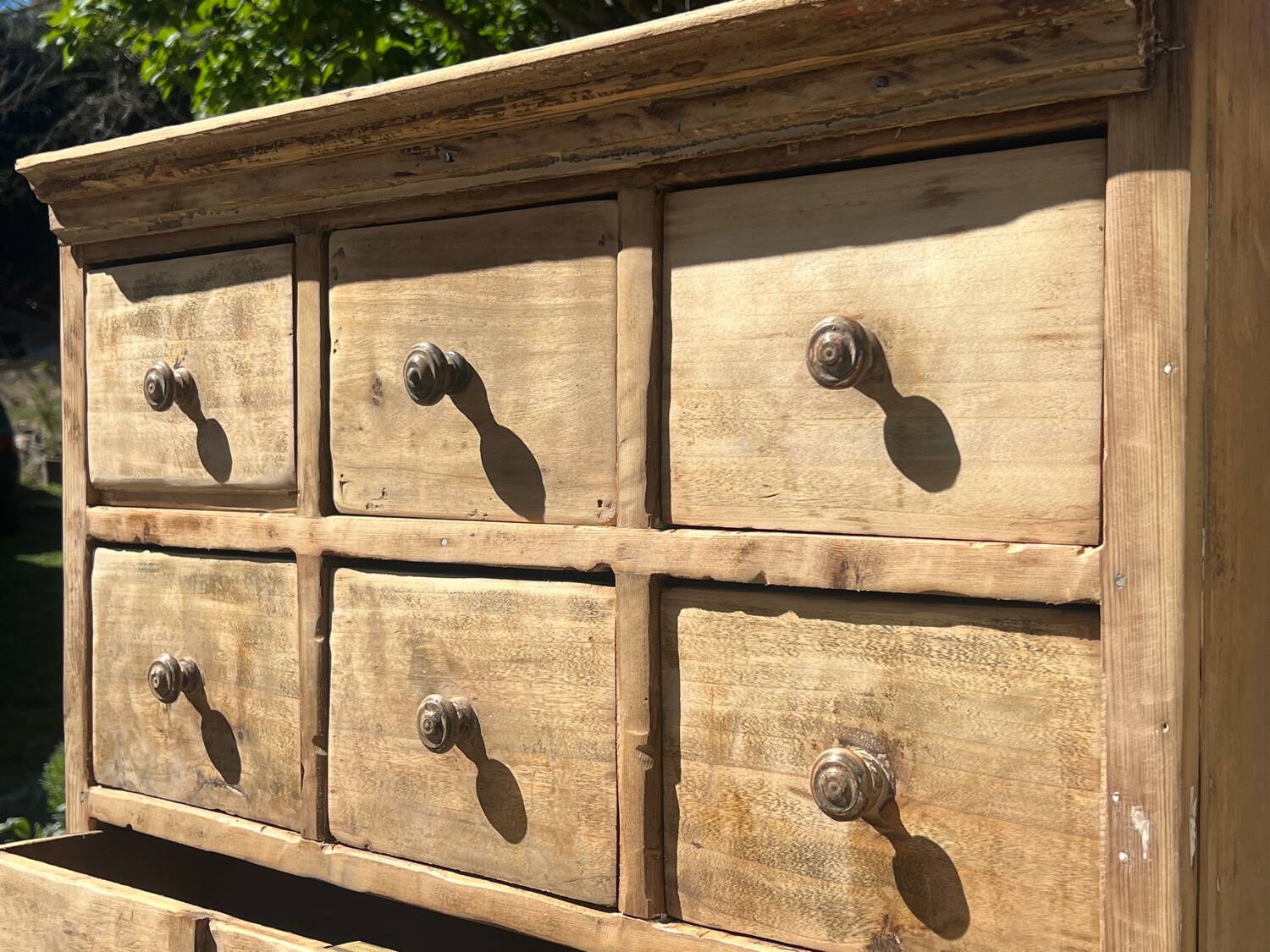 Beautiful piece of furniture with 8 drawers/2 doors in raw wood.