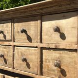 Beautiful piece of furniture with 8 drawers/2 doors in raw wood.