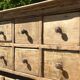 Beautiful piece of furniture with 8 drawers/2 doors in raw wood.