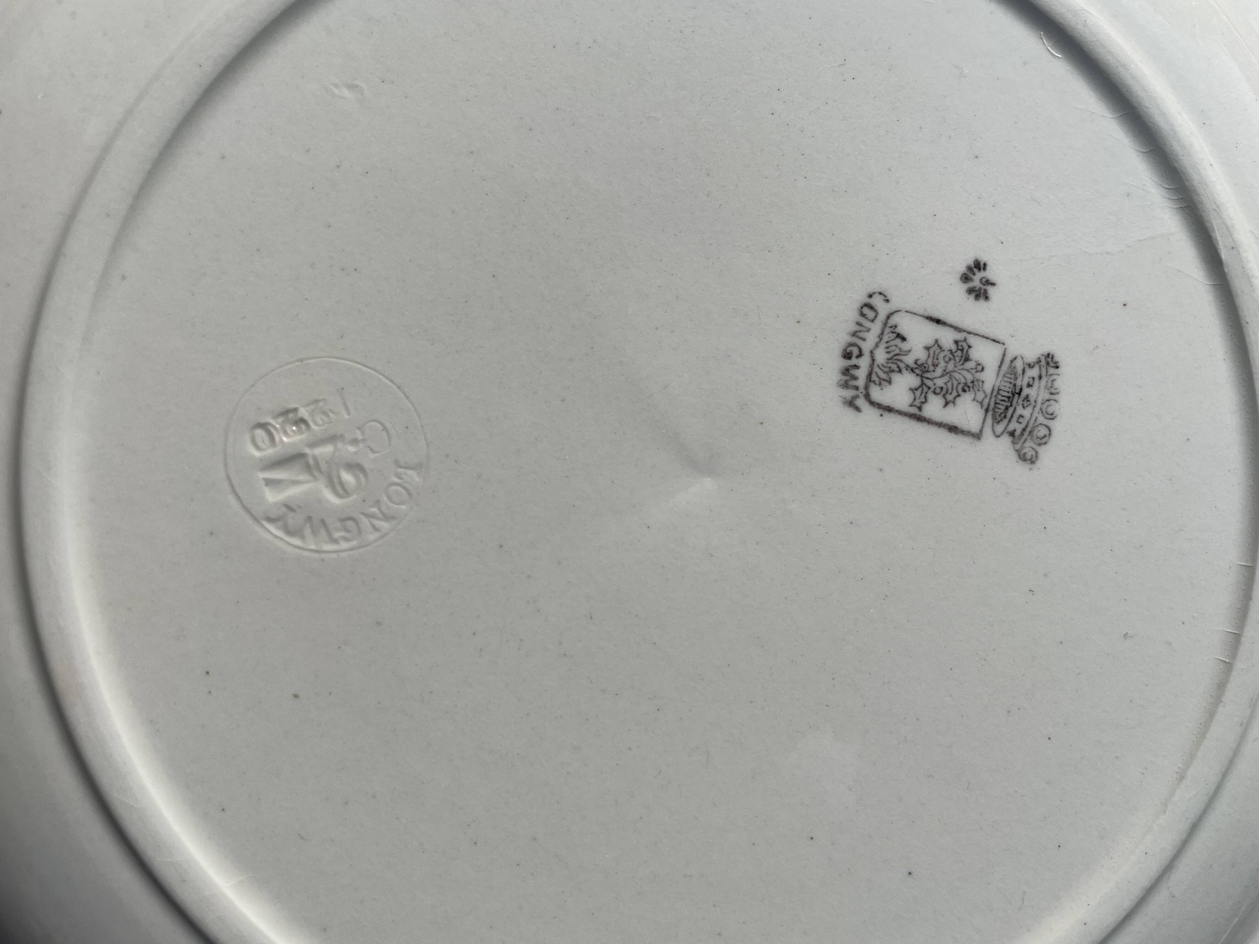 Set of 8 flat plates of Longwy and a small oval dish