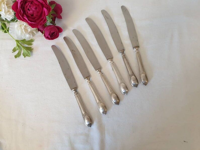 Large antique X6 knives made of silver metal