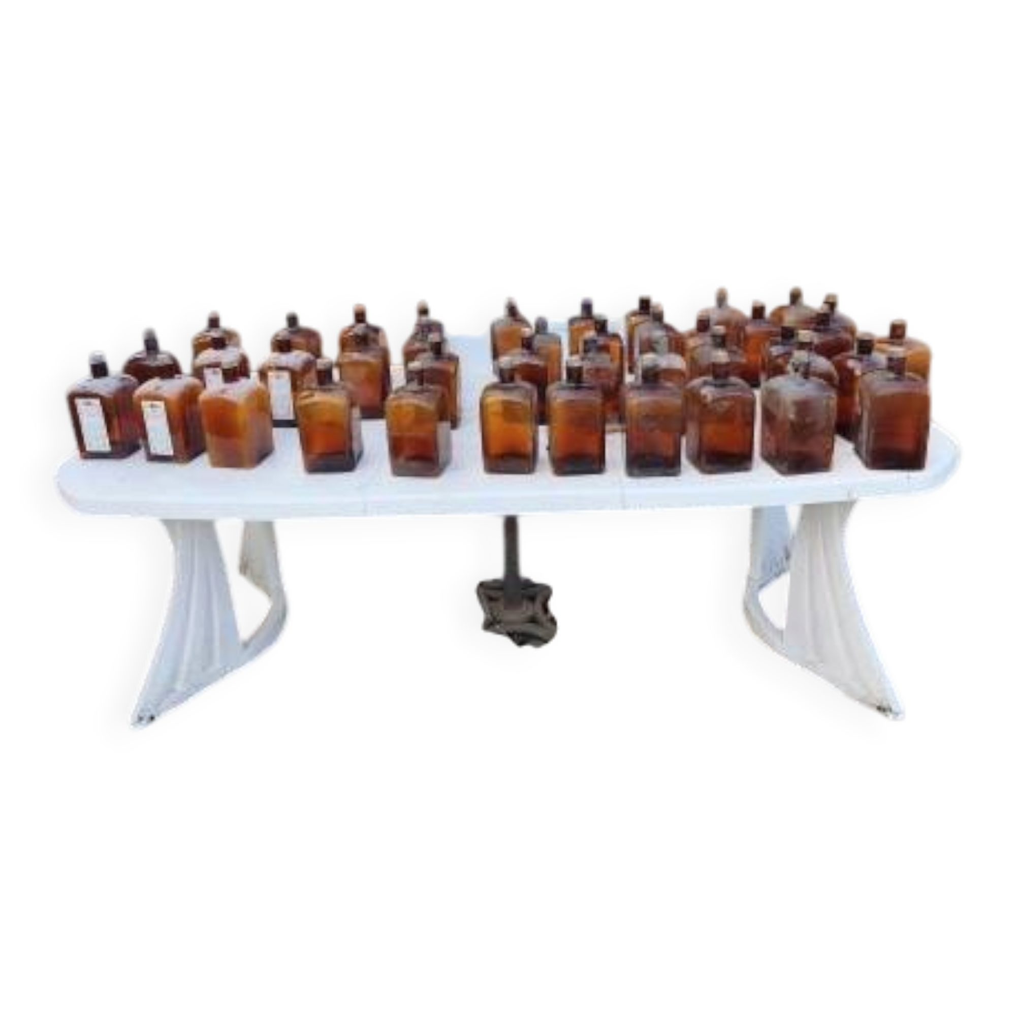 Set of 41 brown glass pharmacy bottles.
