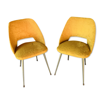 Pair of yellow moumout chairs