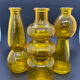 Set of 3 yellow corrugated glass vases