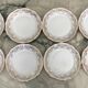 8 white and gold porcelain dessert plates