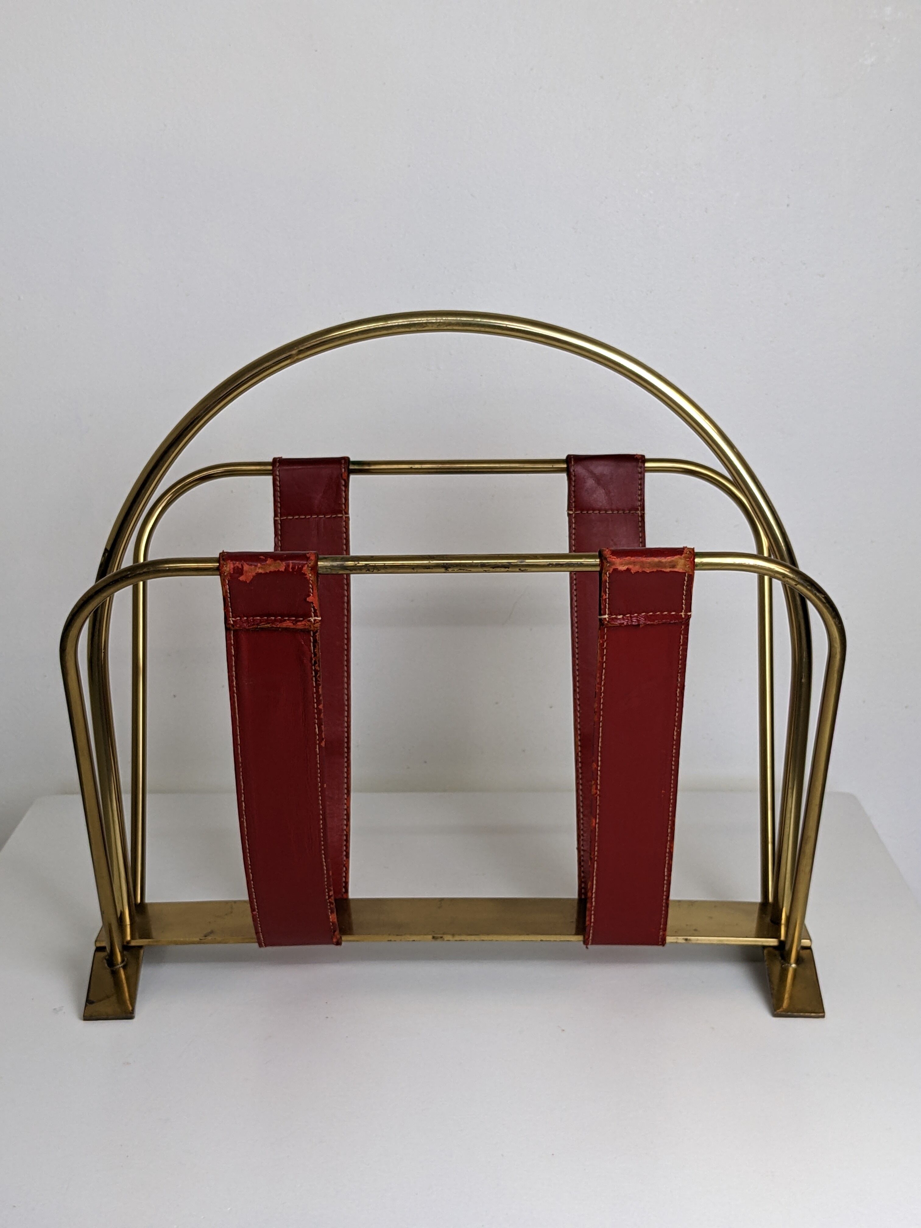 Brass and leather magazine holders, France, 50s