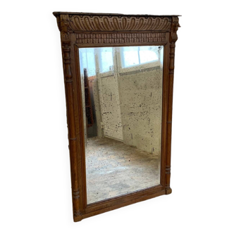 Miroir ancien de cheminée en bois sculpté et miroir biseauté