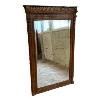 Antique fireplace mirror in carved wood and beveled mirror
