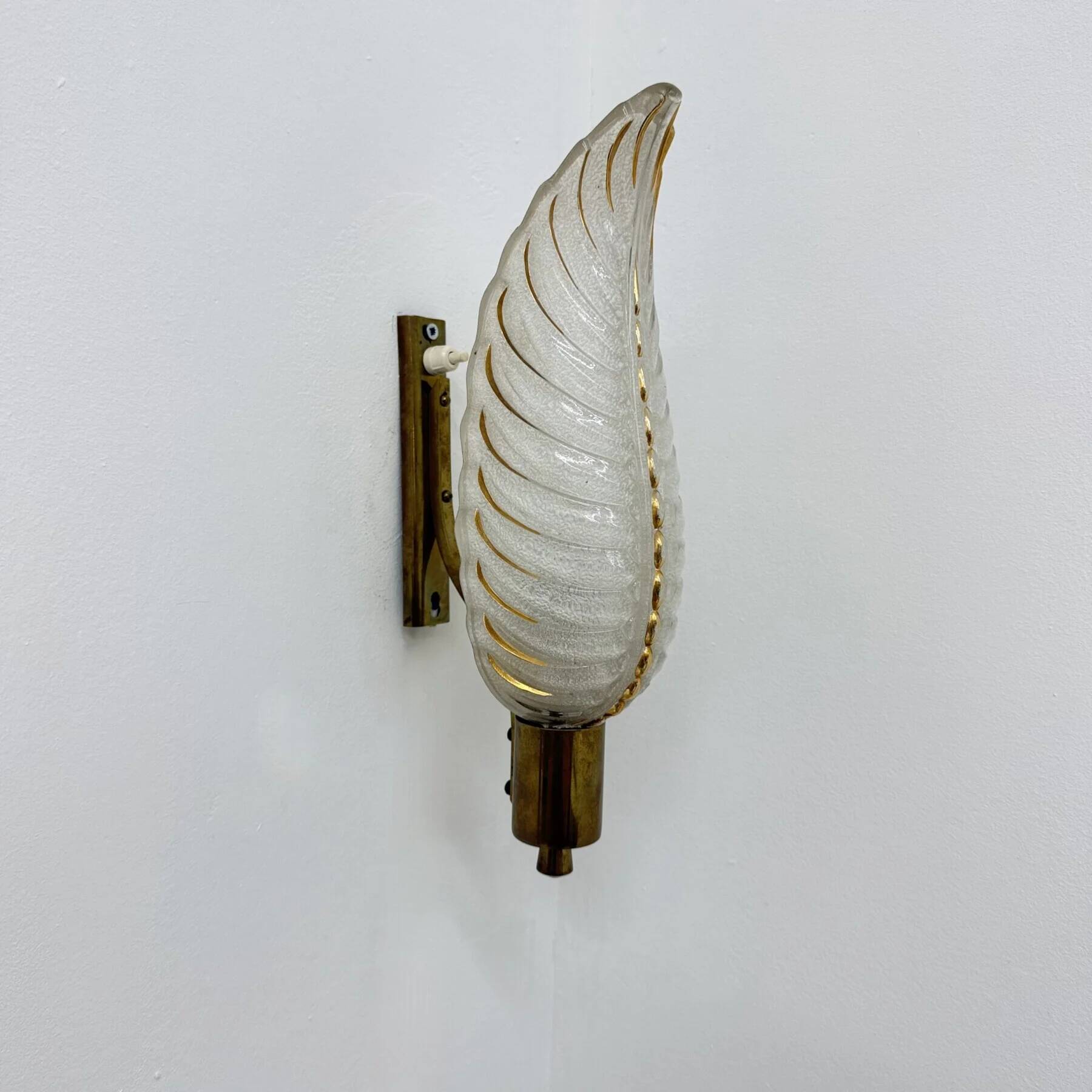 Art Deco brass and glass sconce by Ezan, France, 1940s