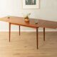 Elegant mid-century dining table with extension function, 1960s, teak veneer