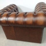 Brown leather chesterfield armchair