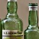 Lot de 4 bouteilles anciennes "L'Hermitage" eau d'arquebuse de Saint Genis Laval (Dept 69)