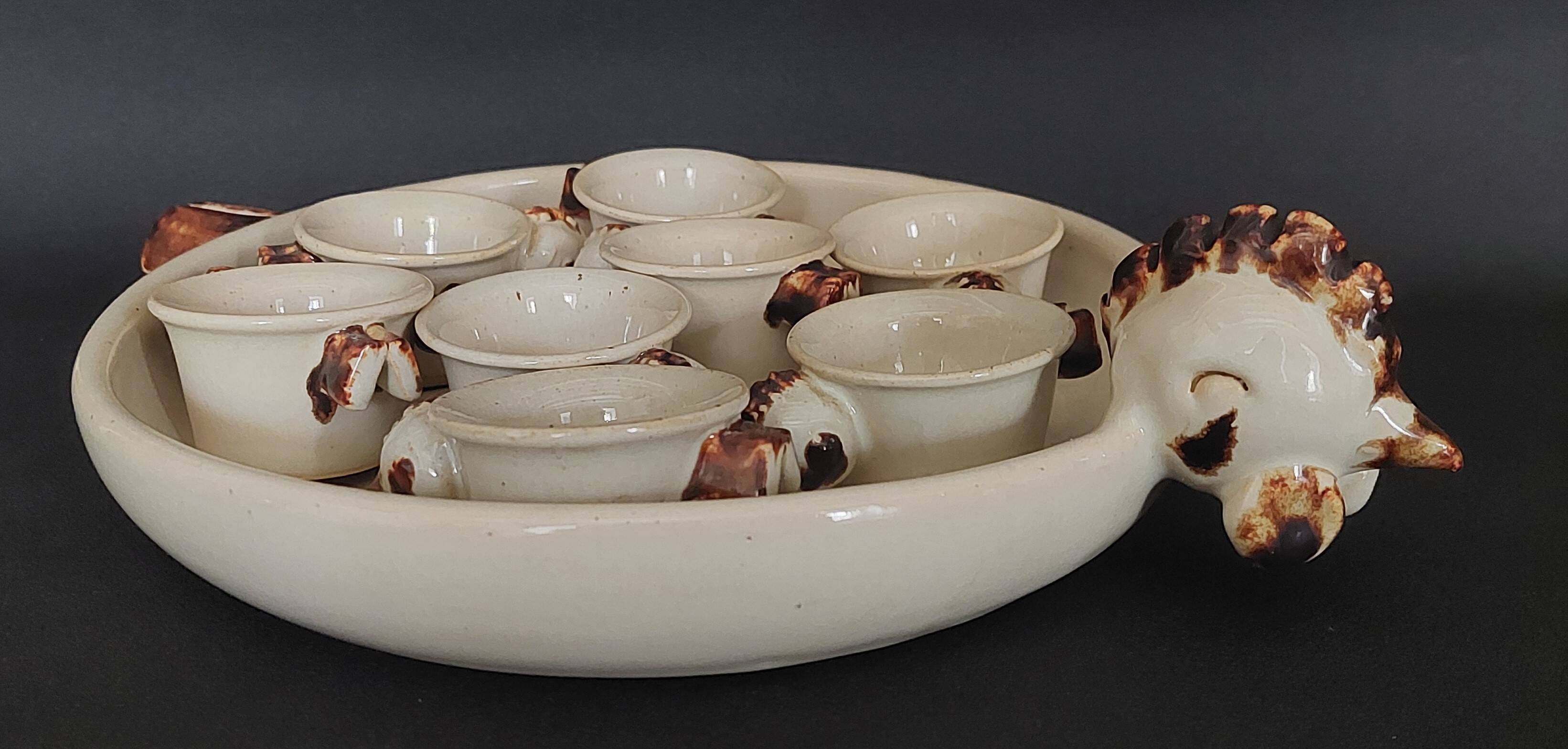 Egg cups with servant, series of eight stoneware signed arts ceram grand feu XX