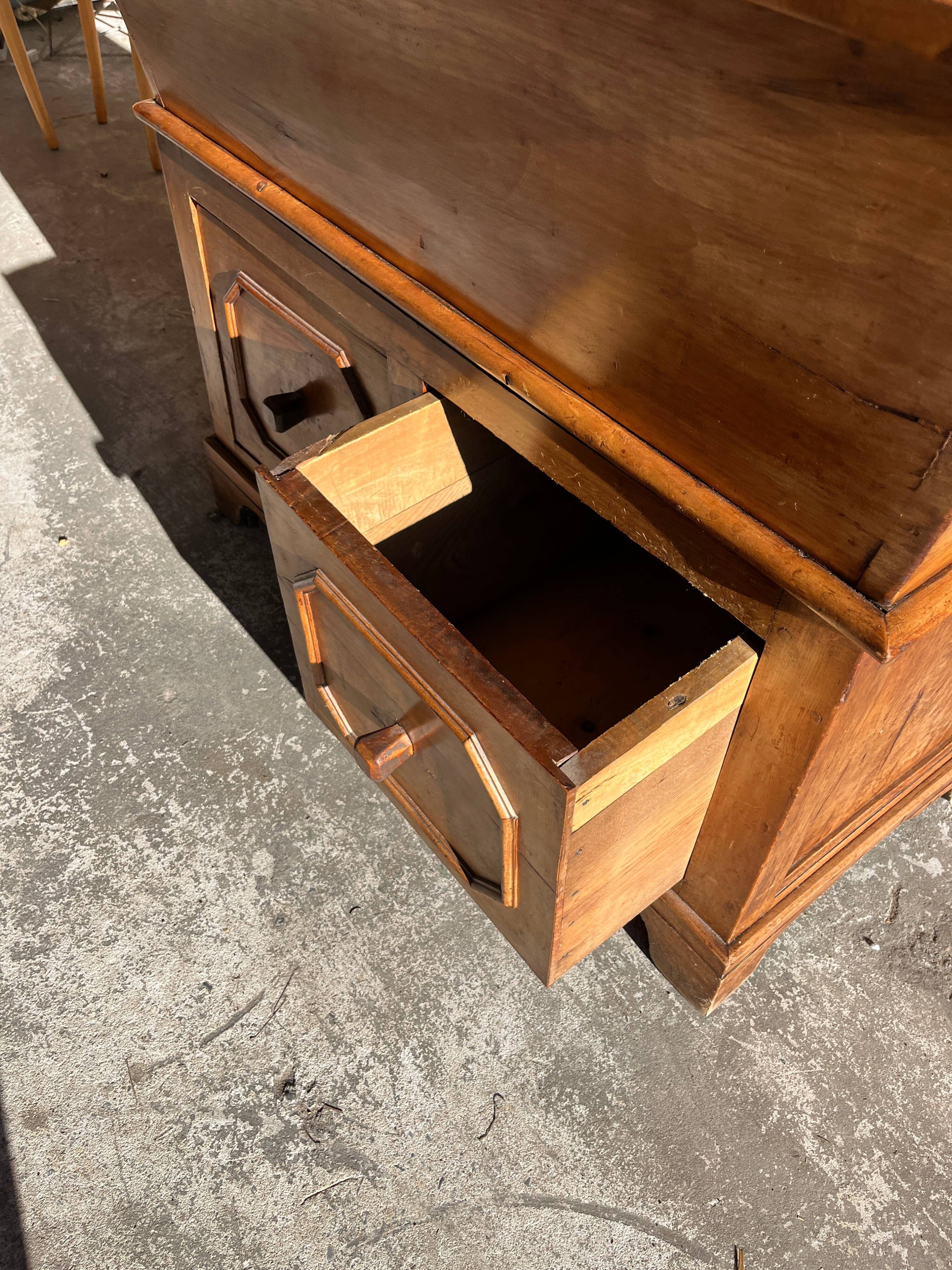 Old wooden baker's chest with storage drawers