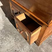 Old wooden baker's chest with storage drawers