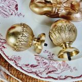 2 gilded brass door handles