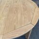 Table à manger scandinave ronde extensible décapée en chêne brut 1970