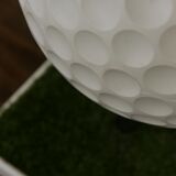 Sedie-Tee seat produced by Gufram in form of a golf ball set on a tee