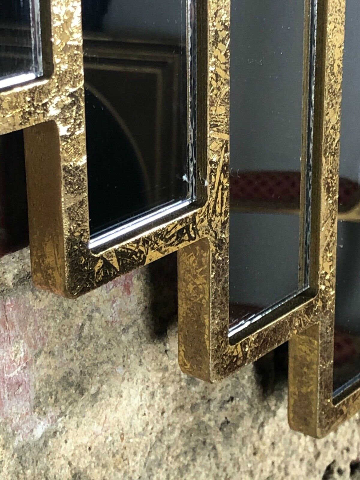 Art deco style "miami" mirror in patinated gilded wood 80x52cm