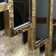 Art deco style "miami" mirror in patinated gilded wood 80x52cm