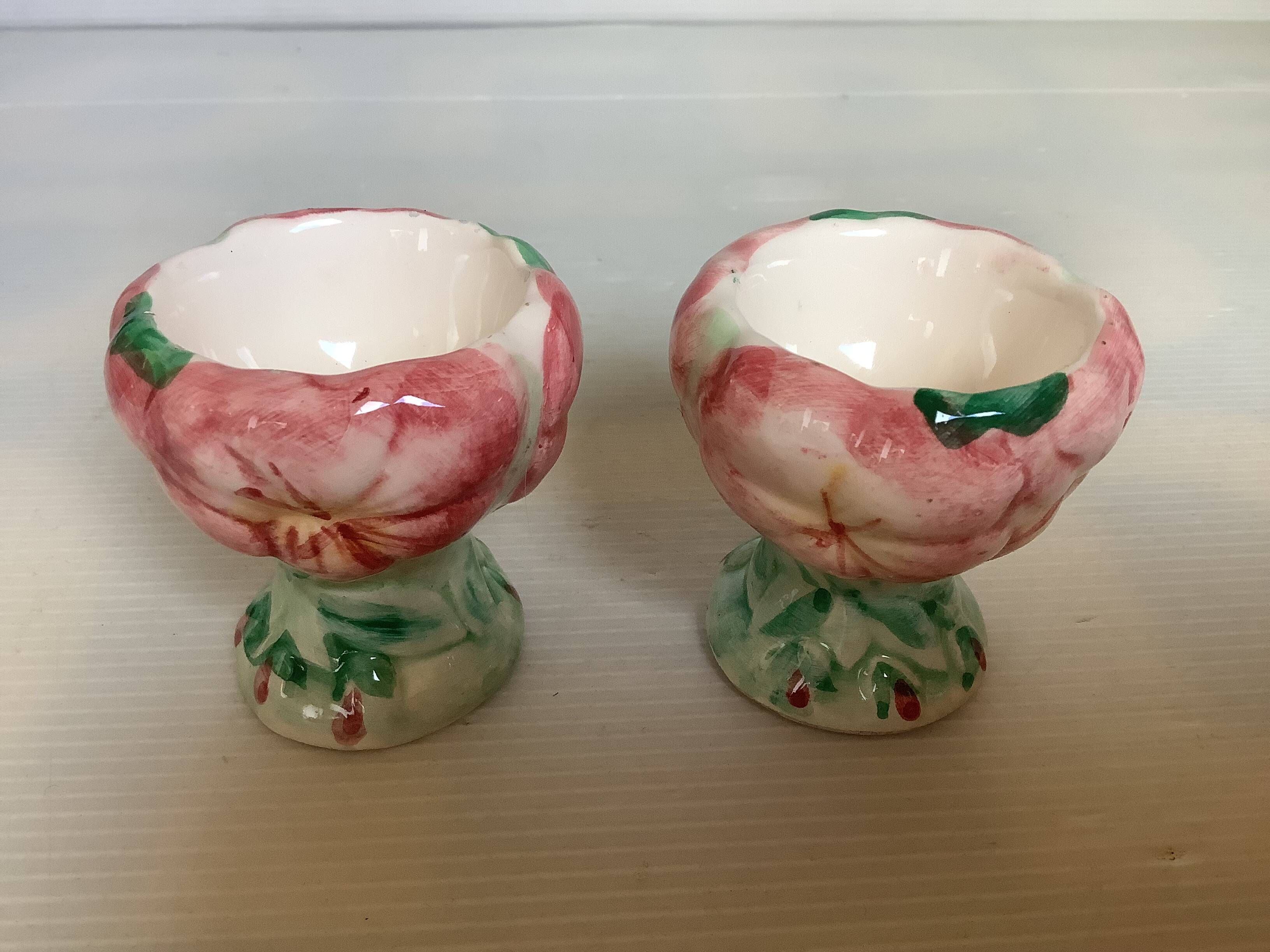 Pair of majolica egg cups