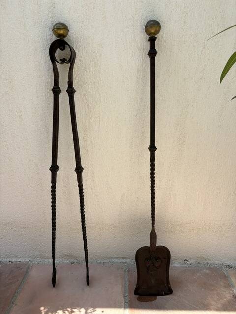 Large fireplace tongs and shovel from the 19th century.