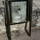 Folding garden or bistro table in khaki sheet metal from the early 1950s.