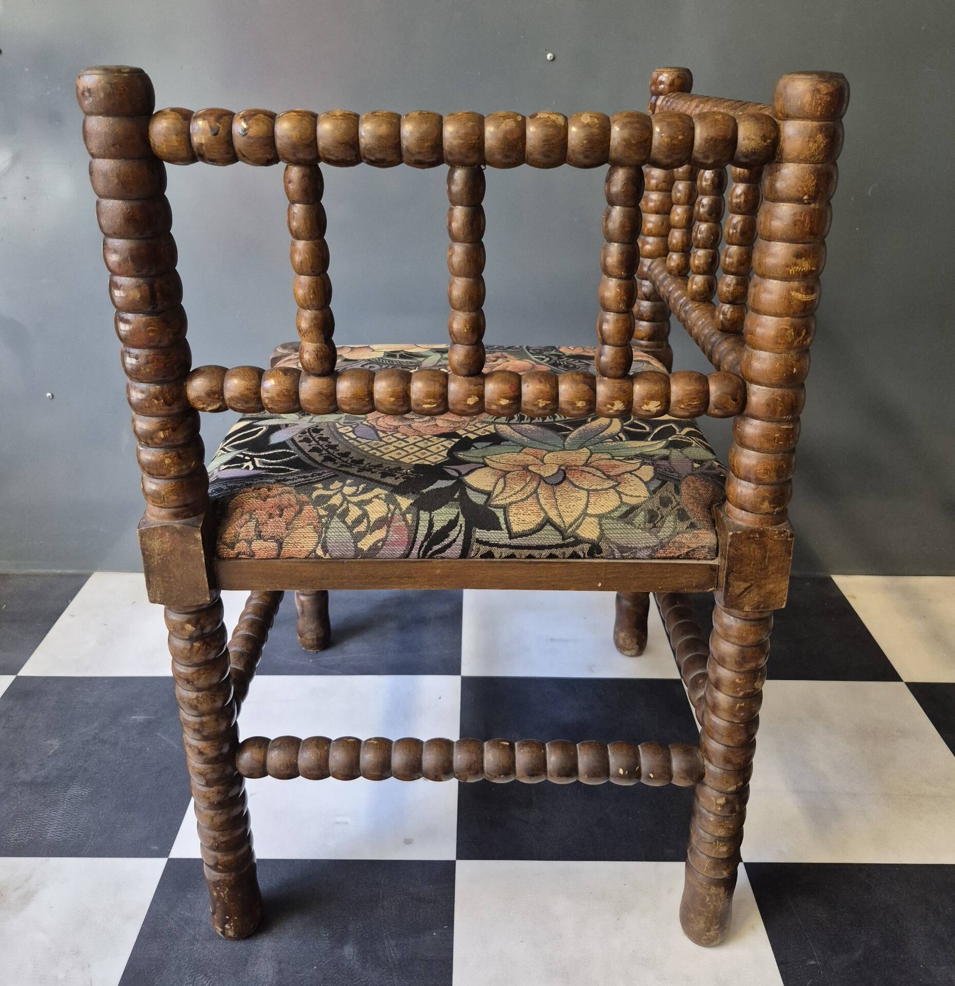 Old pair of corner chairs known as 'fireplace corner' armchairs.