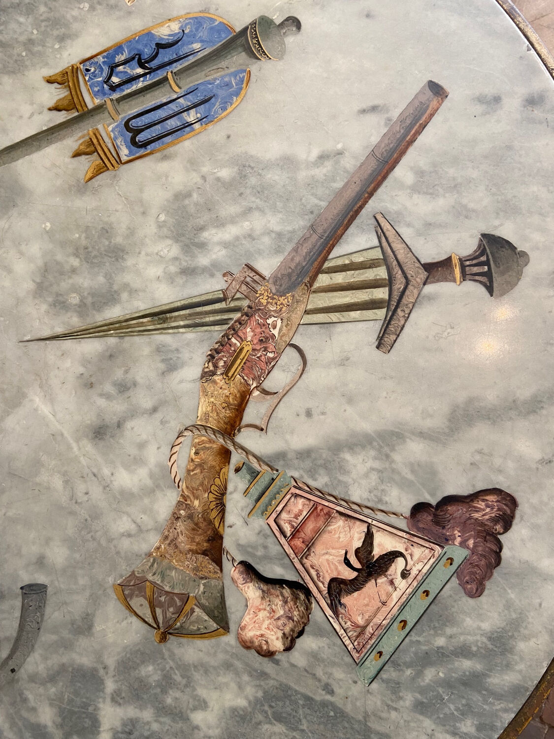 Italian marble painted with pistols and daggers from the NATO