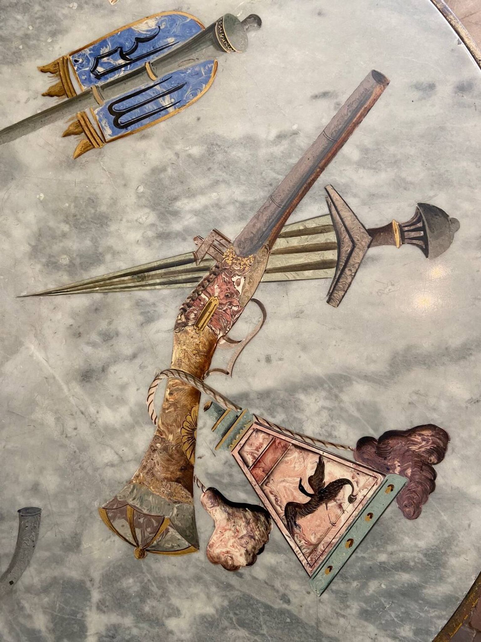 Italian marble painted with pistols and daggers from the NATO