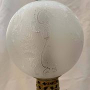 Oil lamp in celadon and bronze with its original glass globe, 19th century.