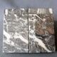 Set of 2 vintage Art Deco bookends in grey, black, and white marble