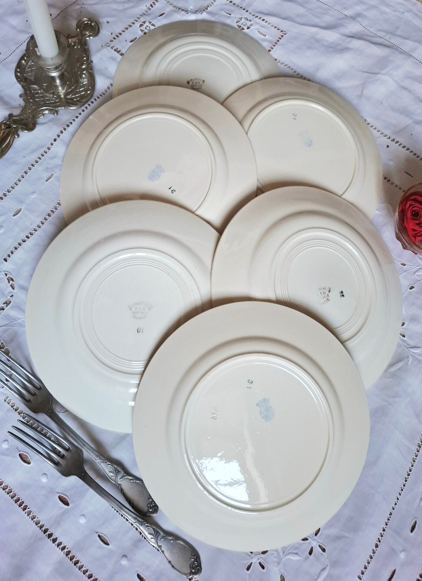 Old mismatched flat plates in earthenware