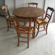 Round wooden table (4/6 people) with 4 straw chairs
