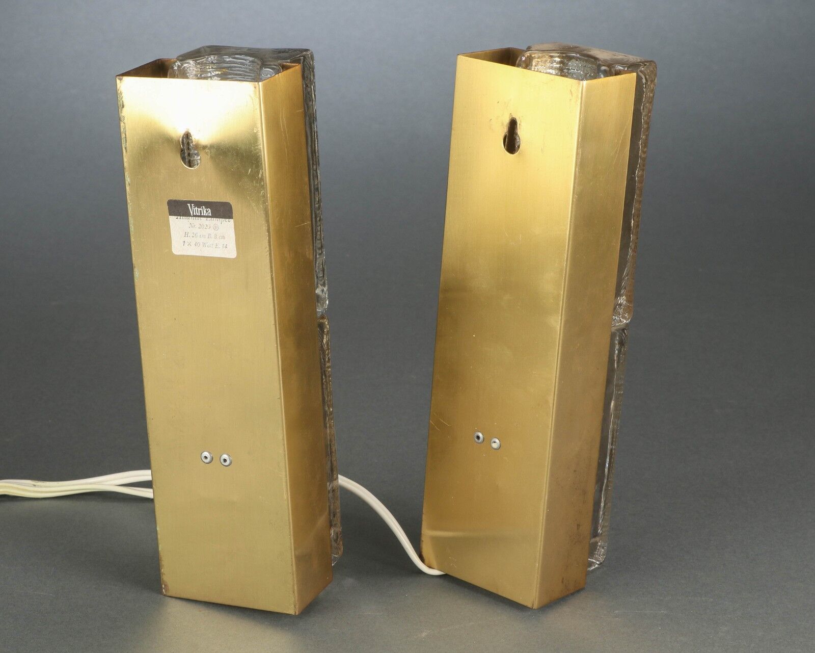 Pair of Vitrika wall lamps in glass and brass