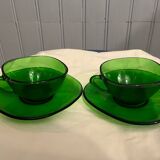 Two cups with saucer