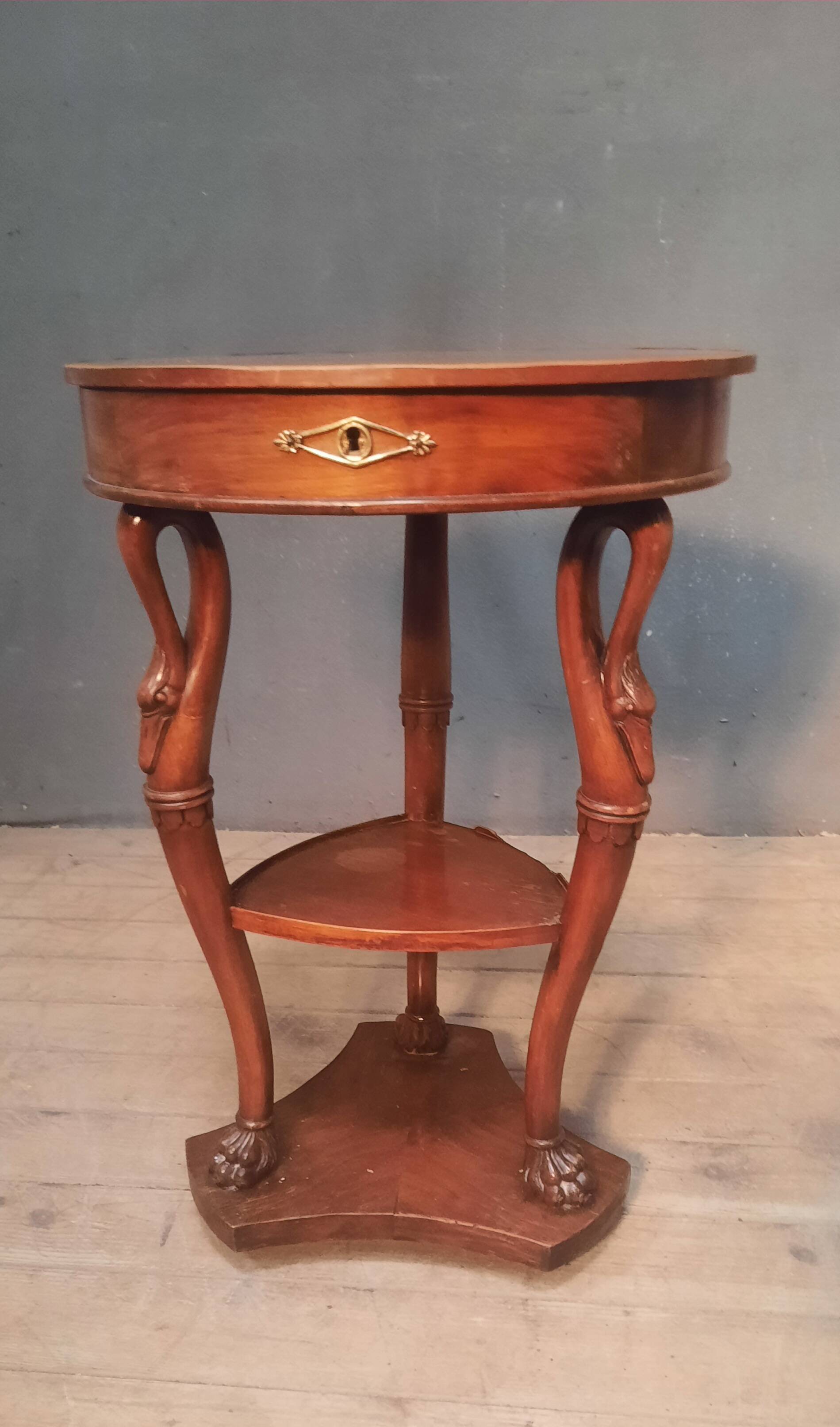Side table with a swan neck.