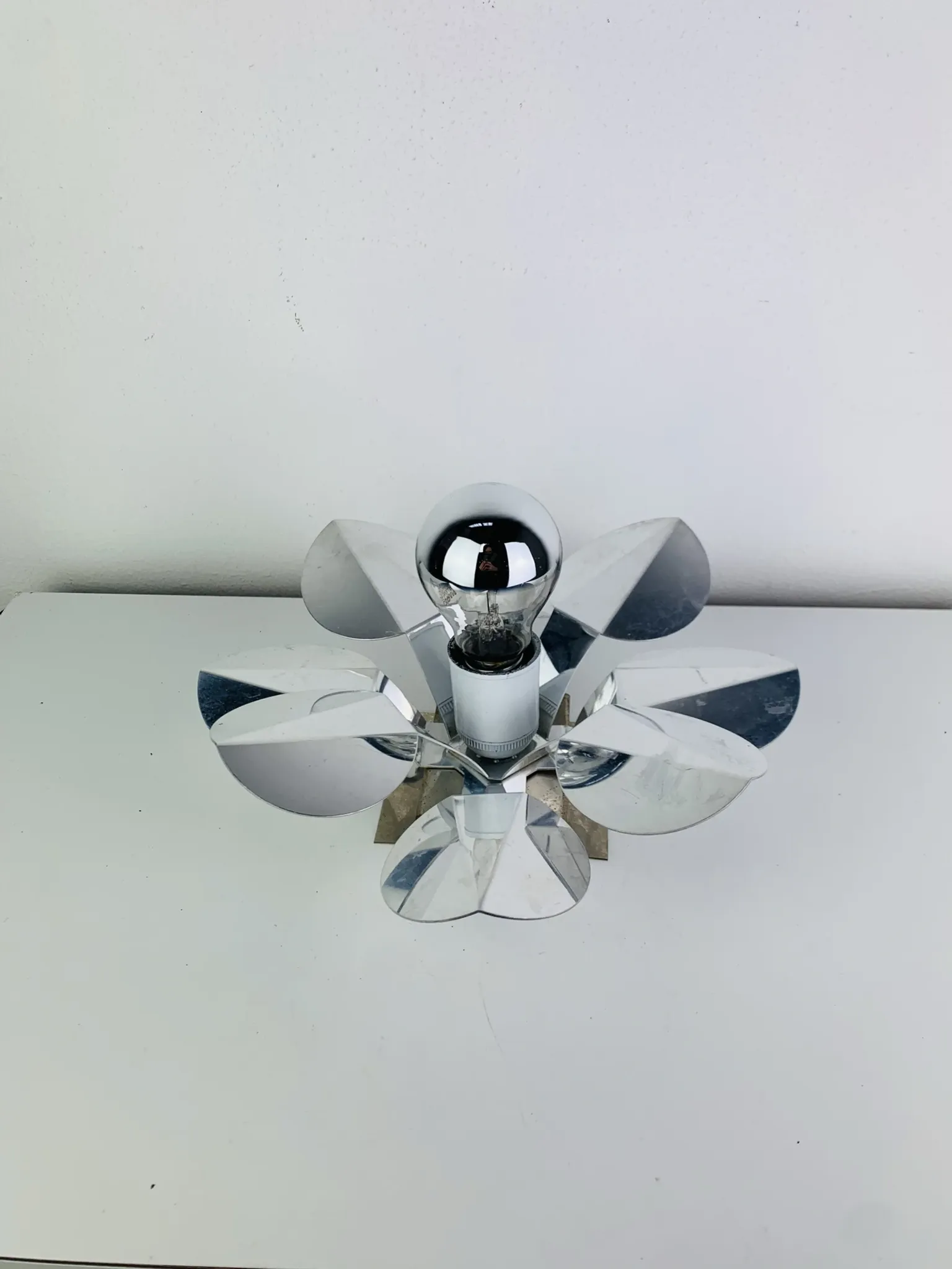 Space Age chrome flower wall light from the 1960s.