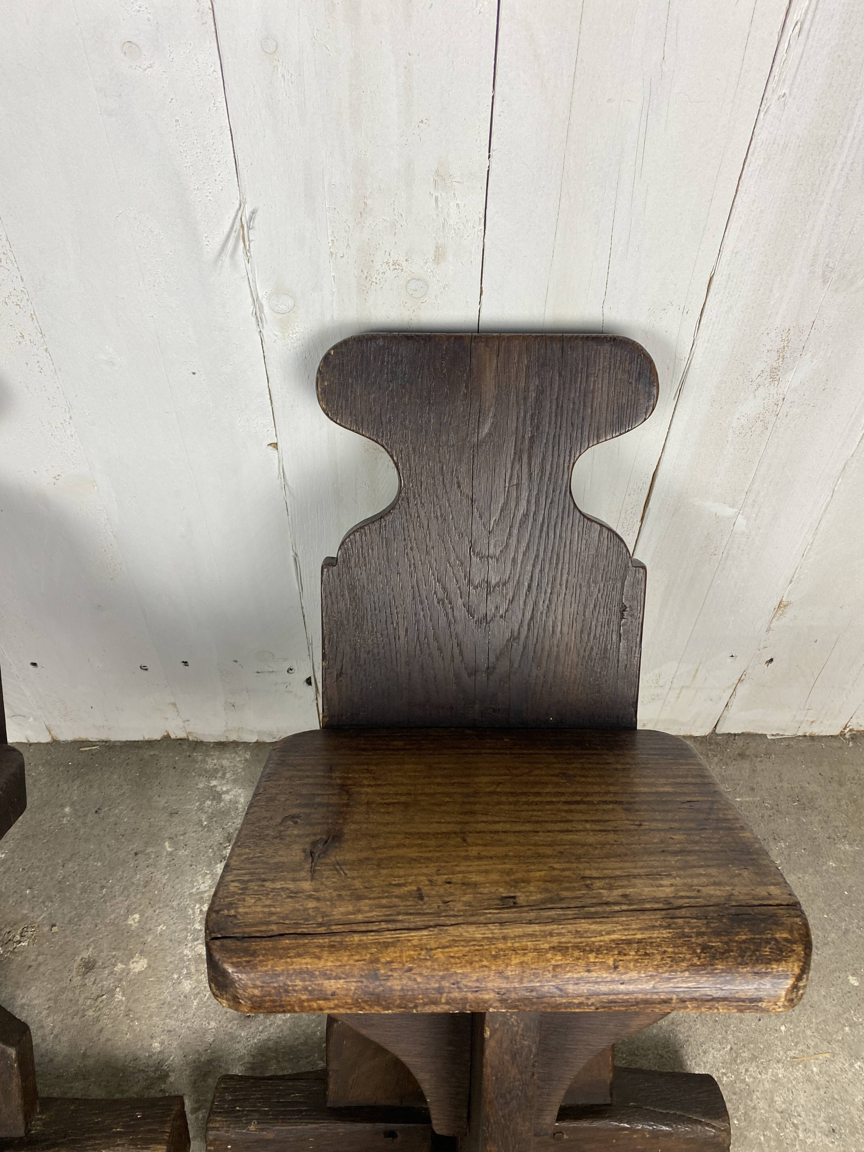 Pair of brutalist oak stools